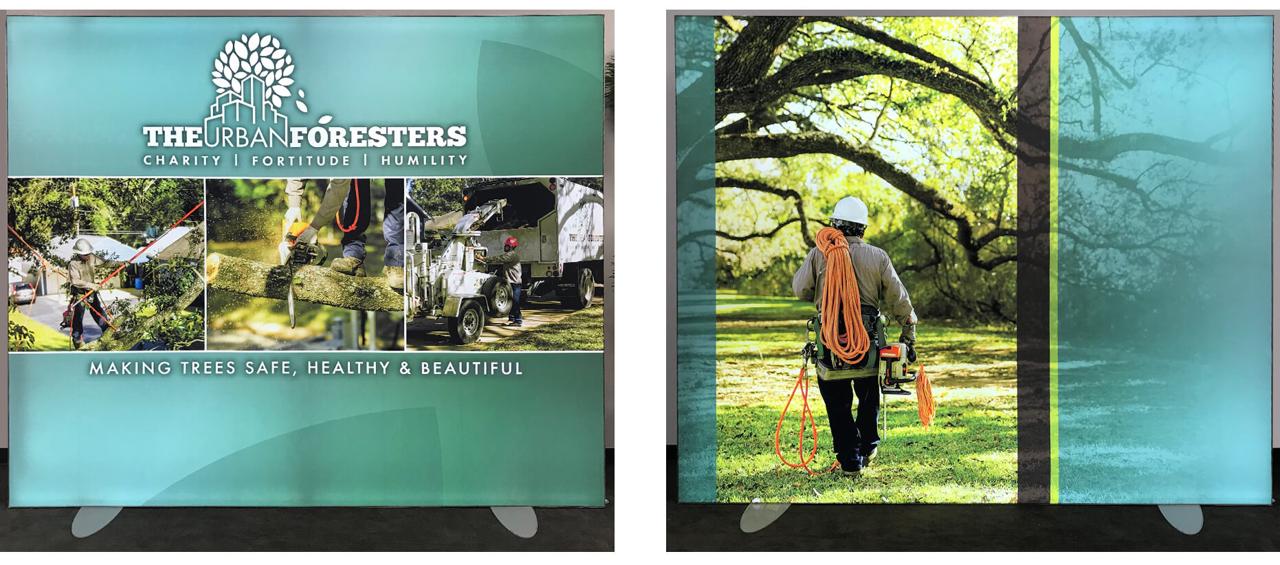 Green 10’ graphic panels with photography of tree services, and a tree trimmer carrying climbing gear and a chainsaw.
