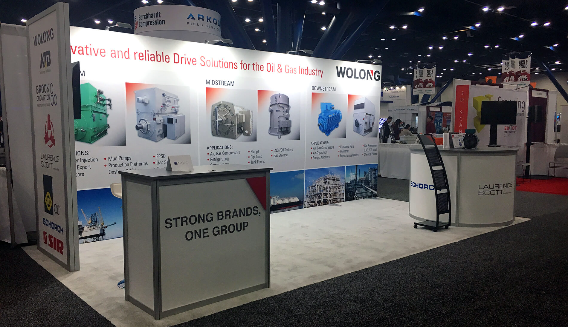 20 x 20  open concept booth with a 20’ branded sign for visibility, custom display counters, lockable walk-in storage