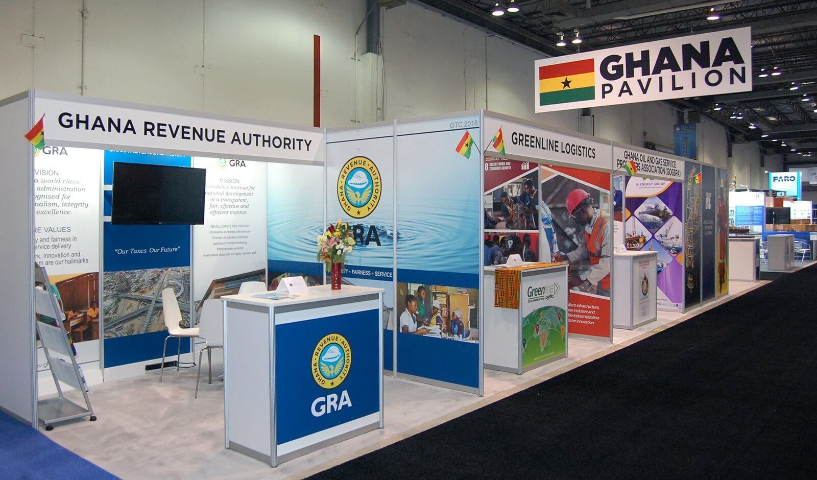 30 x 50 exhibitor space with a large hanging sign at OTC. Exhibit Network efficiently used the space to maximize traffic flow