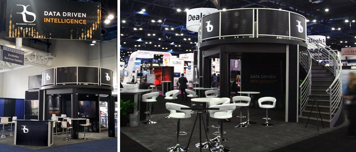 RSEG branded double-deck trade show highlighting the downstairs bistro seating area and a curved staircase to the upper deck