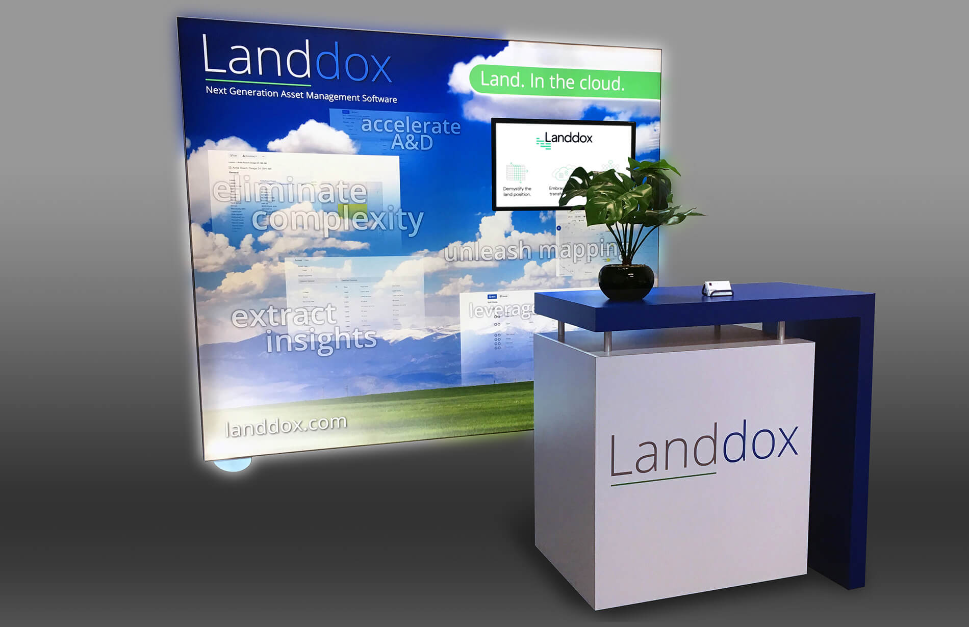 Branded floating, touchscreen monitor system with lockable counter, plant, and business cards in a turnkey rental package