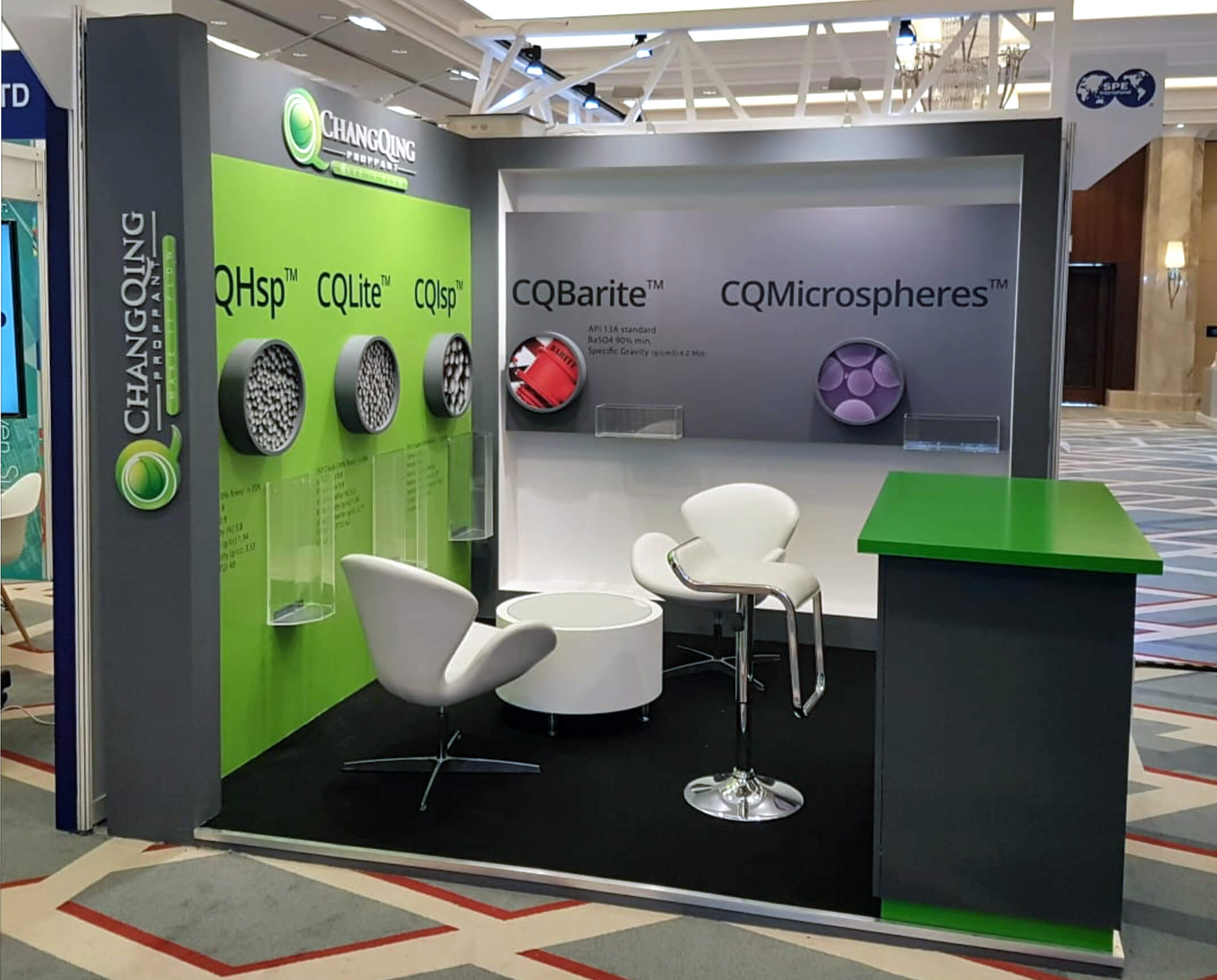 Branded, rent-to-own exhibit with sleek white seating shipped by Exhibit Network to SPE ATCE and SPE HFTC